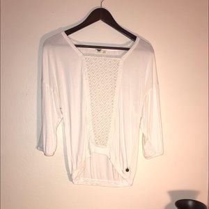 White blouse with pattern down the middle